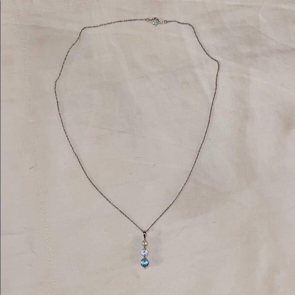 Necklace with three aqua marine stones